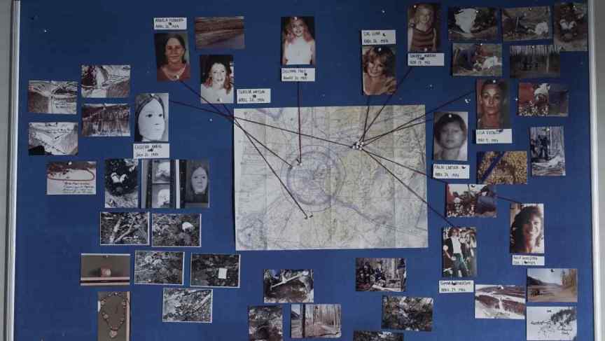 The murder map, with photos of a selection of Hansen’s victims with string pointing to where they were found, and crime scene photos
