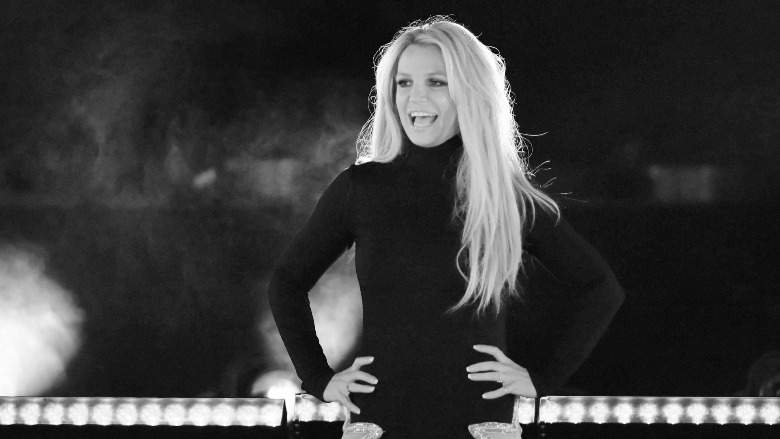 Britney Spears wearing a black dress.