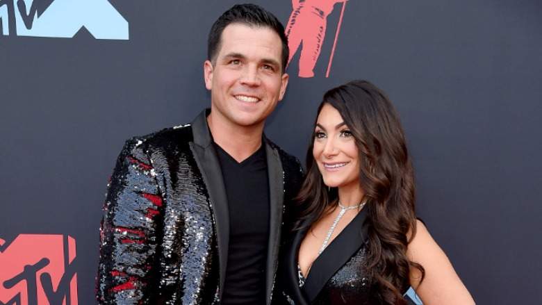 Chris Buckner and Deena Nicole on the red carpet.