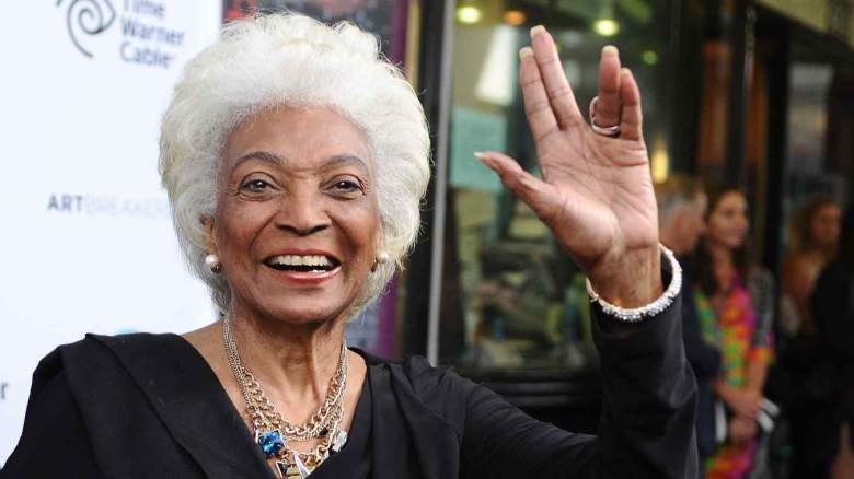 Nichelle Nichols flashing the Vulcan greeting