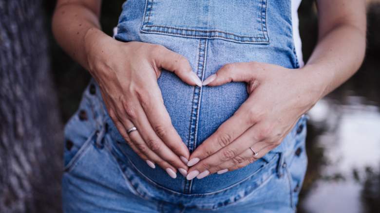 A pregnant woman.