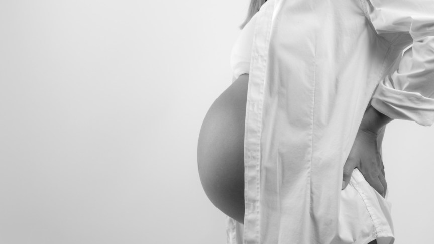A pregnant woman.