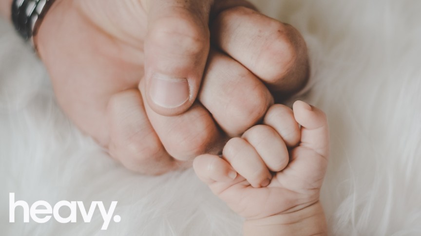 Daddy and baby's hands