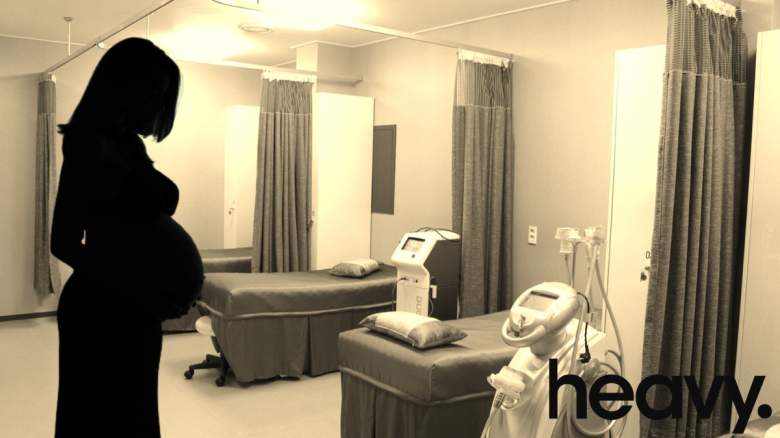 A pregnant woman.