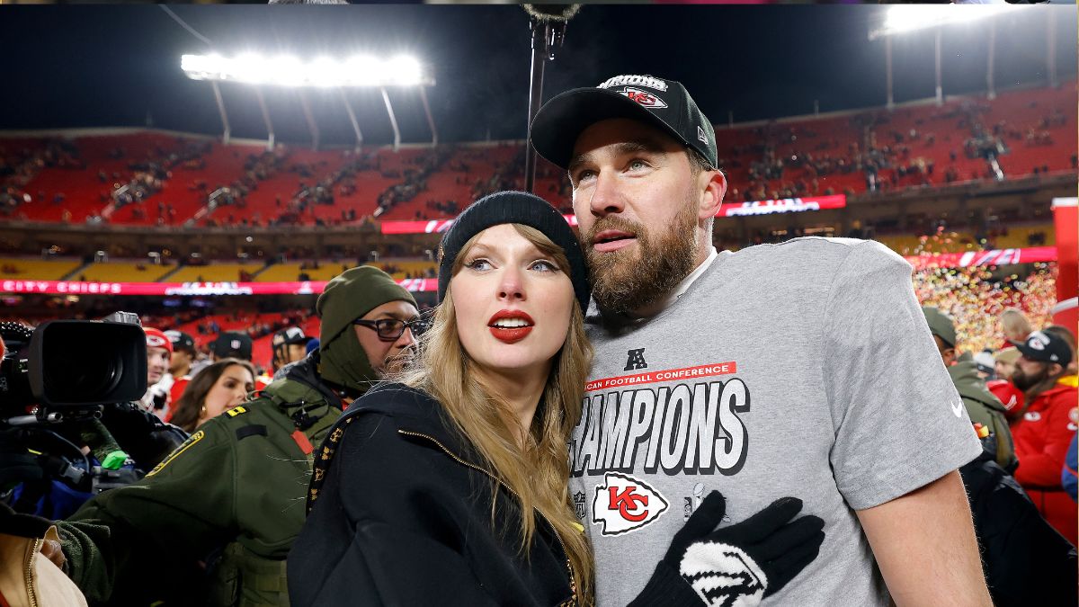 Taylor Swift celebrates with Travis Kelce #87 of the Kansas City Chiefs after defeating the Buffalo Bills 32-29 in the AFC Championship Game