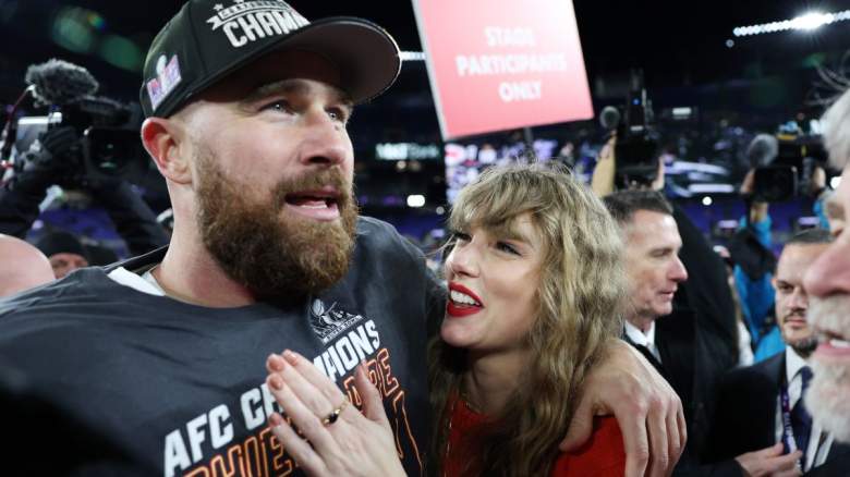Travis Kelce #87 of the Kansas City Chiefs celebrates with Taylor Swift after a 17-10 victory against the Baltimore Ravens in the AFC Championship Game