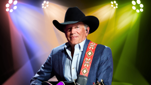 George Strait smiling on stage