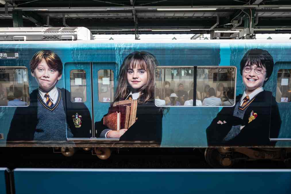 A train adorned with Harry Potter characters 