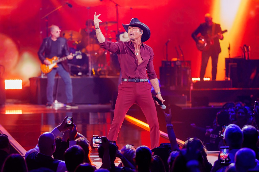 Tim McGraw performing on stage