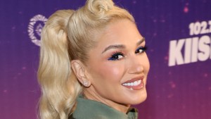 Gwen Stefani smiling at event.
