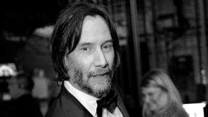 Keanu Reeves Has Perfect Reaction to Jonathan Groff Straddling Him at Tony Awards