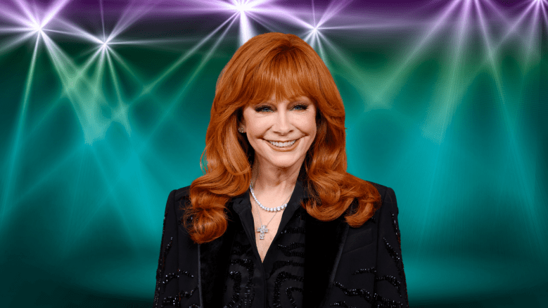 Reba McEntire smiling on stage