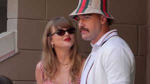 Taylor Swift (L) and US NFL football player Travis Kelce (R) attend the men's final match between Italy's Jannik Sinner and USA's Taylor Fritz on day fourteen of the US Open tennis tournament at the USTA Billie Jean King National Tennis Center in New York City, on September 8, 2024