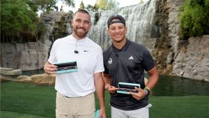 Travis Kelce (L) and Patrick Mahomes pose for photos after winning Capital One's The Match VIII - Curry & Thompson vs. Mahomes & Kelce at Wynn Golf Club on June 29, 2023 in Las Vegas, Nevada