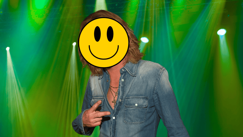 Bucky Covington holding up a peace sign with face obscured.
