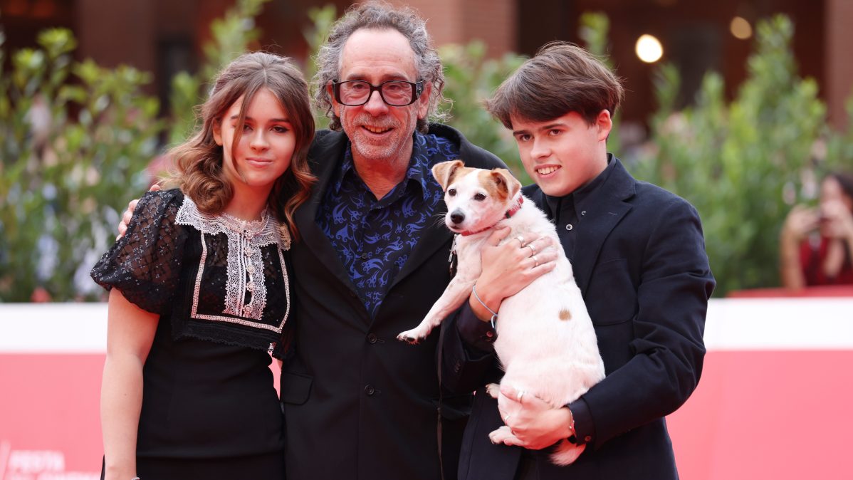 Nell Burton, Tim Burton, Billy-Ray Burton, and Levi (the dog) at the 16th Rome Film Fest in 2021
