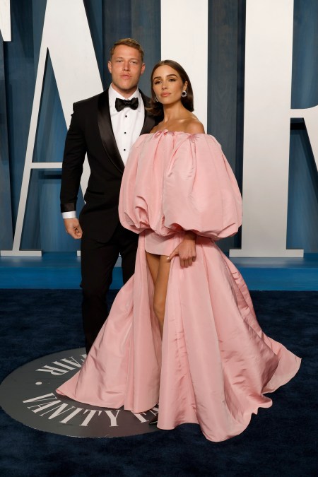 Christian McCaffrey and Olivia Culpo attend a party in 2022