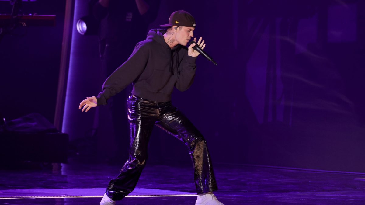 Justin Bieber performing on stage in 2022