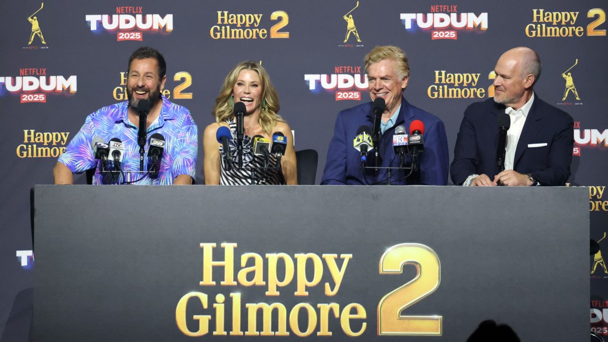 Adam Sandler, Julie Bowen, Christopher McDonald, and Rich Eisen speak onstage during NETFLIX TUDUM