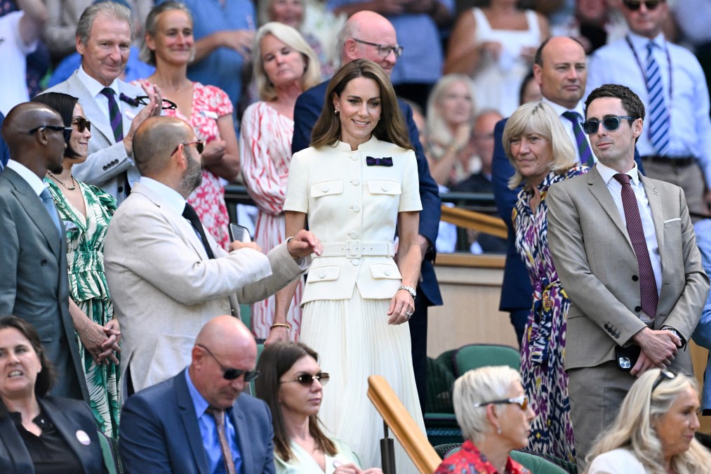 Britain's Catherine, Princess of Wales (C) arrives in the Royal Box 