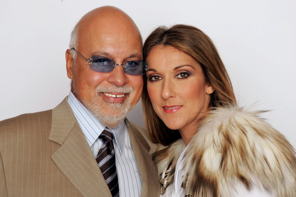 Celine Dion and her husband Rene Angelil pose for a picture backstage during the 2004 World Music Awards 