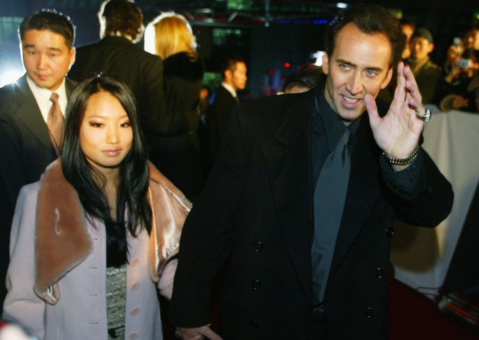 Nicolas Cage (R) and Alice Kim on December 13, 2004 in Seoul, South Korea.