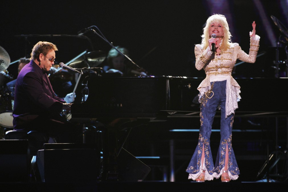 Elton John and Dolly Parton performing together.
