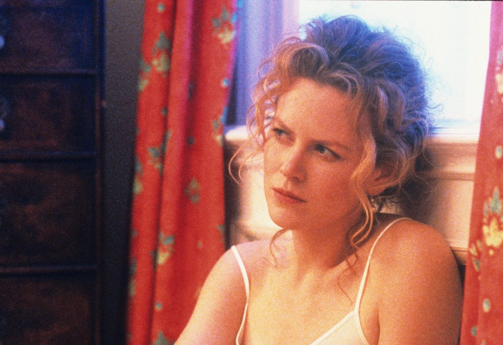 Nicole Kidman looking up while sitting on the floor in a scene from the film 'Eyes Wide Shut', 1999. 
