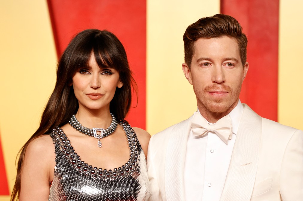 Canadian actress Nina Dobrev (L) and US former snowboarder Shaun White 