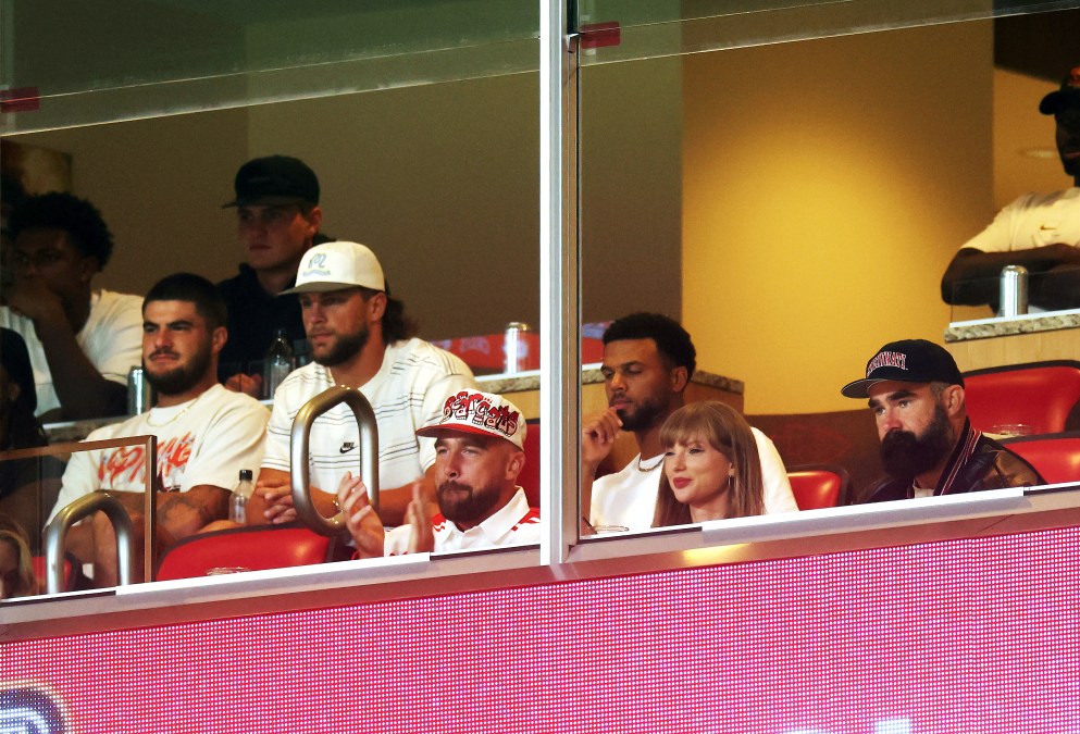  Travis Kelce #87 of the Kansas City Chiefs, Taylor Swift and Jason Kelce 