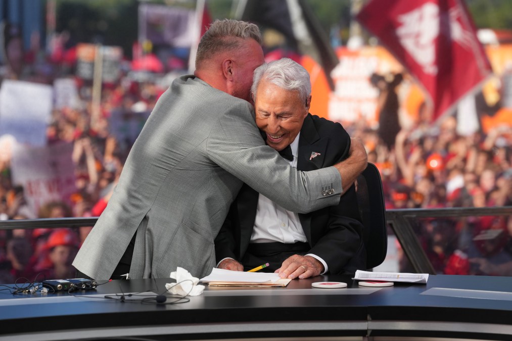 Pat McAfee hugs Lee Corso