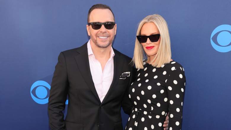 Jenny McCarthy and Donnie Wahlberg wearing sunglasses at an event
