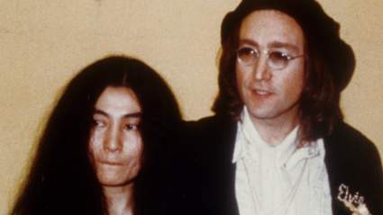 See John Lennon Showing Off His Marriage Certificate on His Wedding Day: PHOTOS