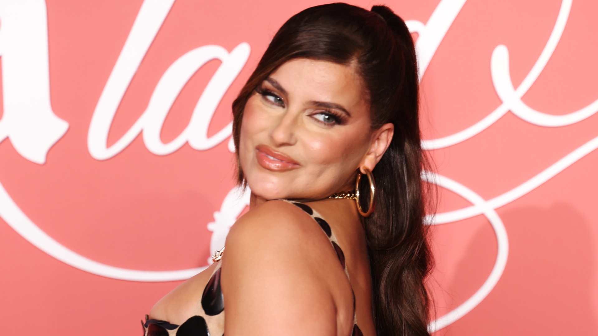 Nelly Furtado poses for photos