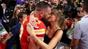 Travis Kelce #87 of the Kansas City Chiefs and Taylor Swift embrace after defeating the San Francisco 49ers in overtime during Super Bowl LVIII at Allegiant Stadium on February 11, 2024