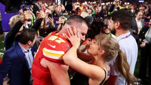 Travis Kelce #87 of the Kansas City Chiefs and Taylor Swift embrace after defeating the San Francisco 49ers 25-22 in overtime during Super Bowl LVIII at Allegiant Stadium on February 11, 2024