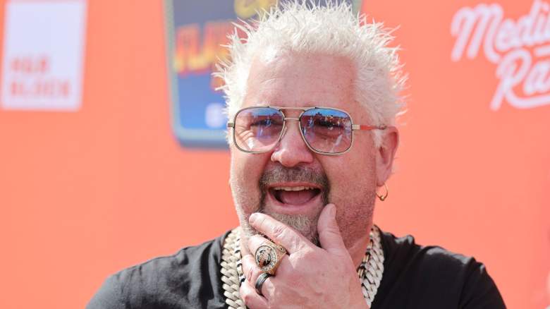 Guy Fieri is interviewed at Guy Fieri's Flavortown Tailgate on February 12, 2023 in Glendale, Arizona