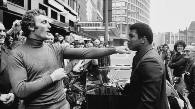 Joe Bugner and Muhammad Ali pretending to box