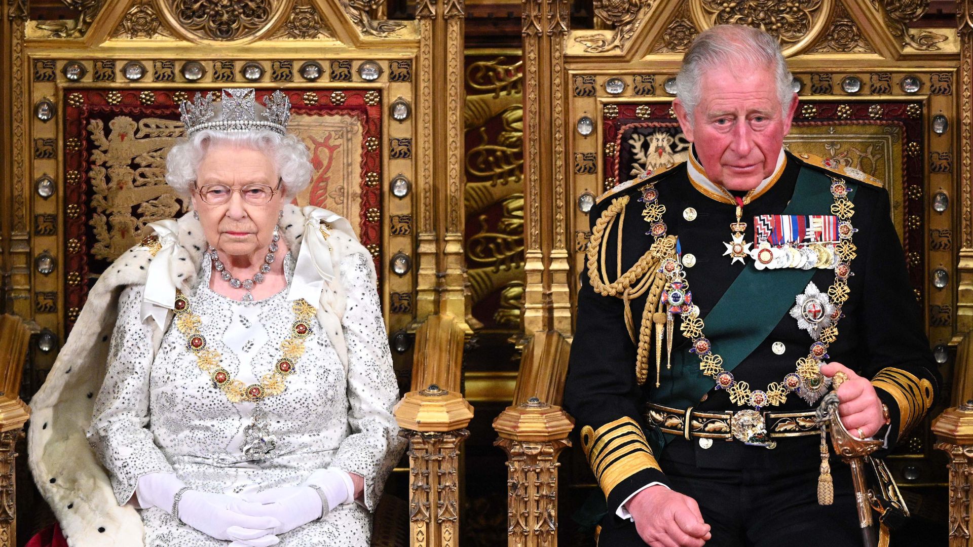 Queen Elizabeth II and Prince Charles, Prince of Wales during the State Opening of Parliament at the Palace of Westminster on October 14, 2019 in London, England