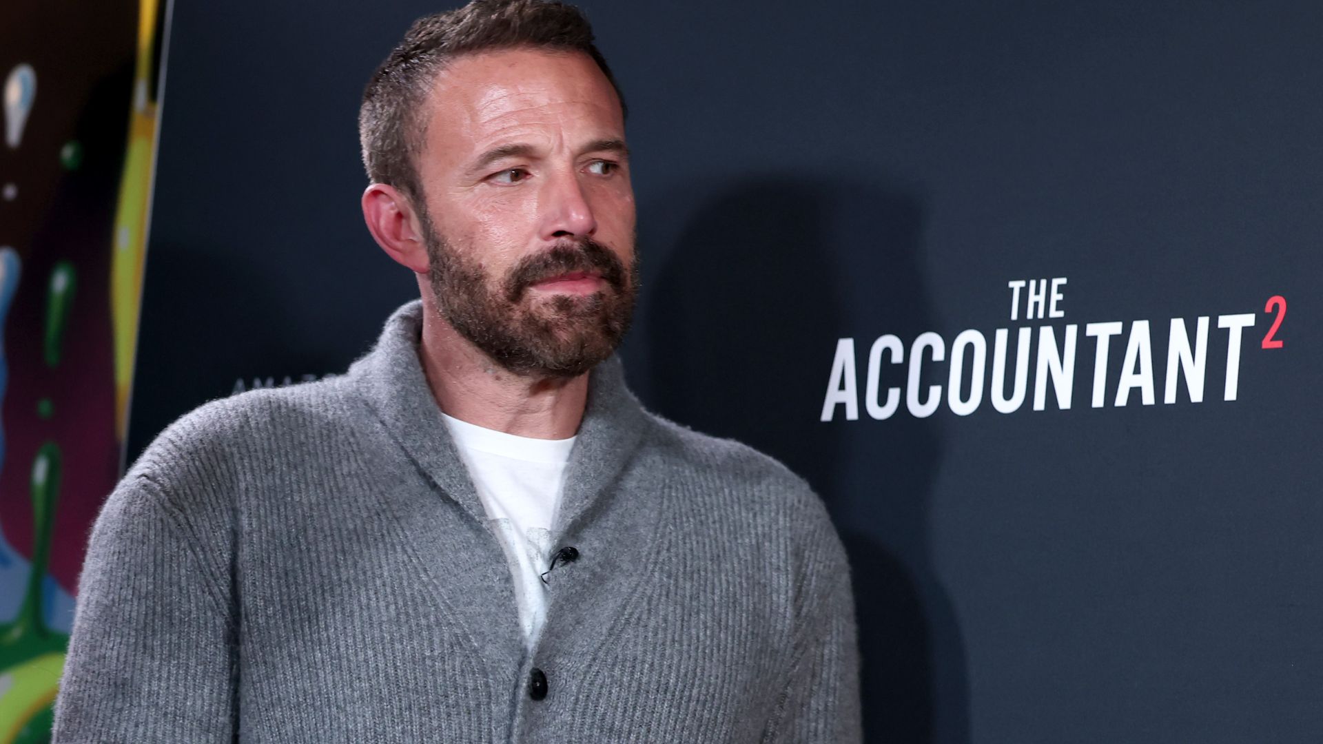 Ben Affleck poses while promoting The Accountant 2