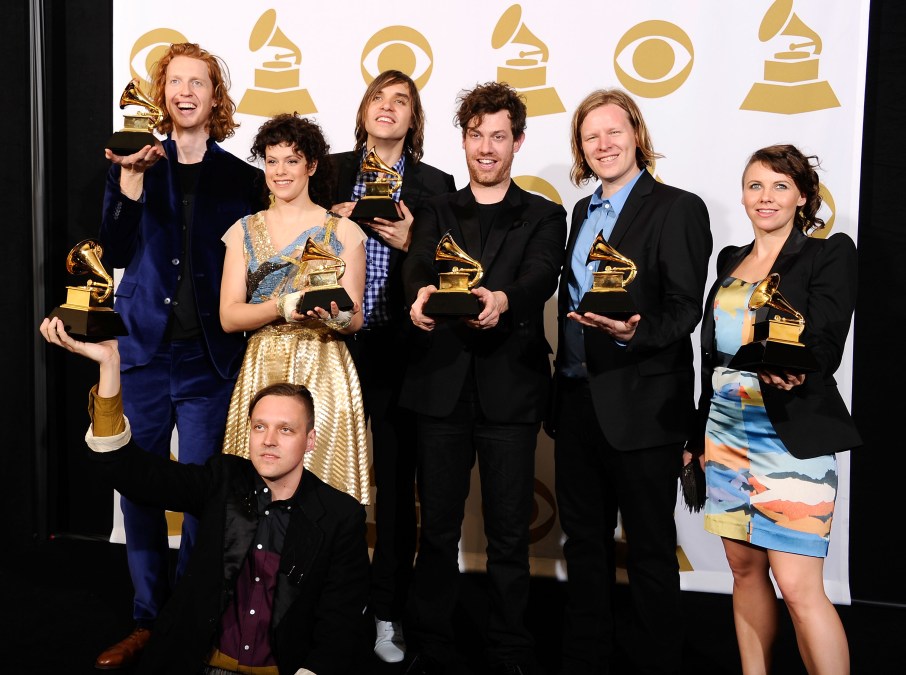 Musicians Richard Reed Parry, Win Butler, Regine Chassagne, William Butler, Jeremy Gara, Tim Kingsbury and Sarah Neufeld