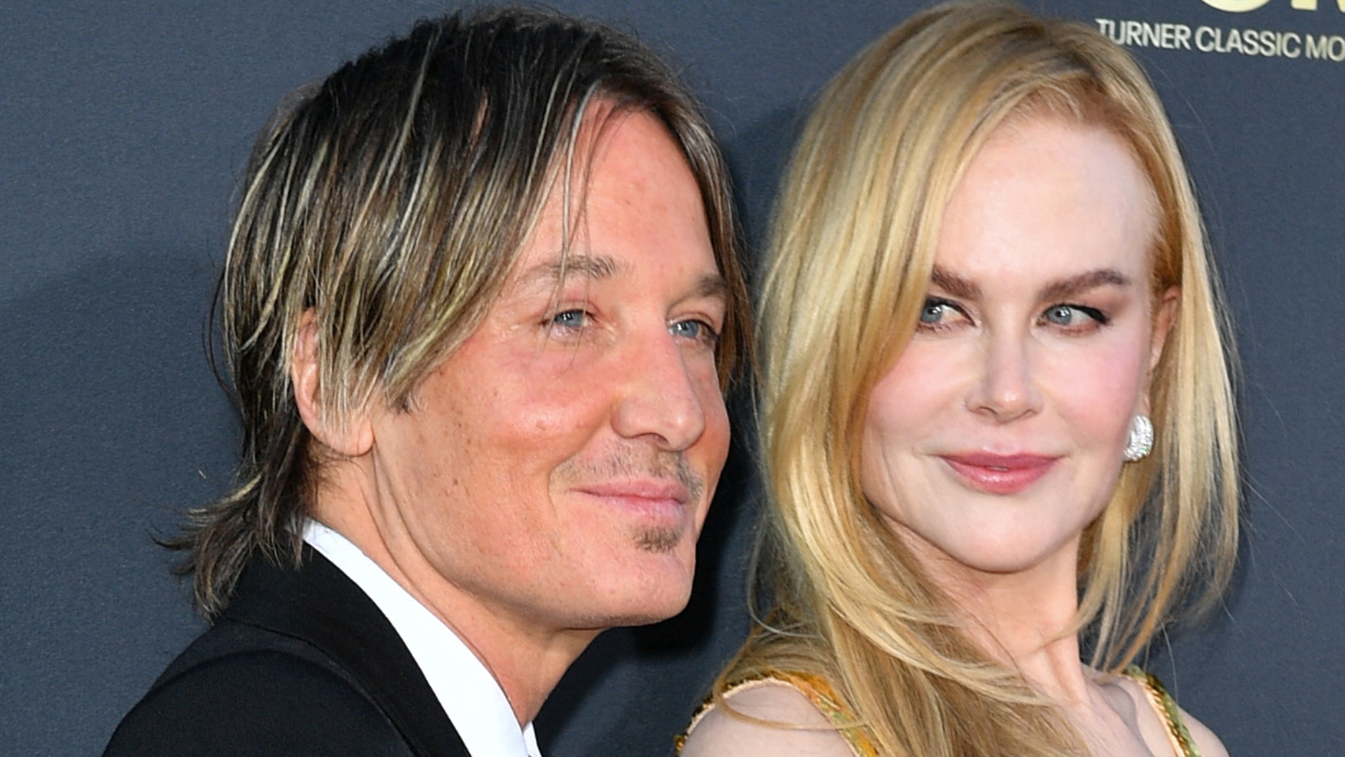 Nicole Kidman and Keith Urban pose for photos at an event