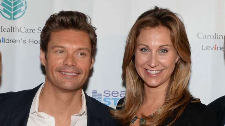 Ryan Seacrest and Meredith Seacrest smiling for photo at an event