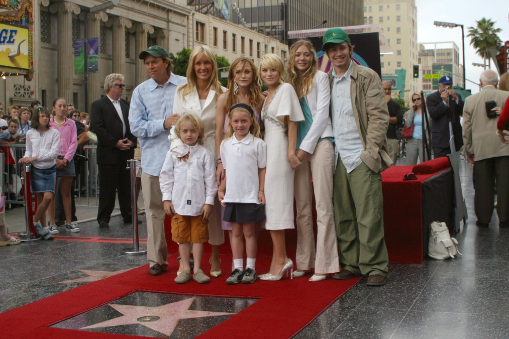 Ashley Olsen and Mary-Kate Olsen with brother Trent and Family;