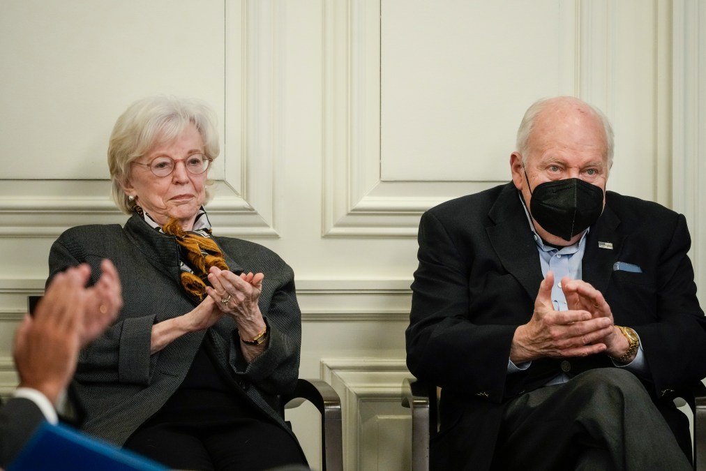 Dick Cheney with Lynne Cheney applauding.