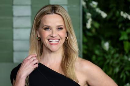 Reese Witherspoon Ditches Colorful Style for a Gothic Corset Mini-Dress at ‘Lucky’ Premiere