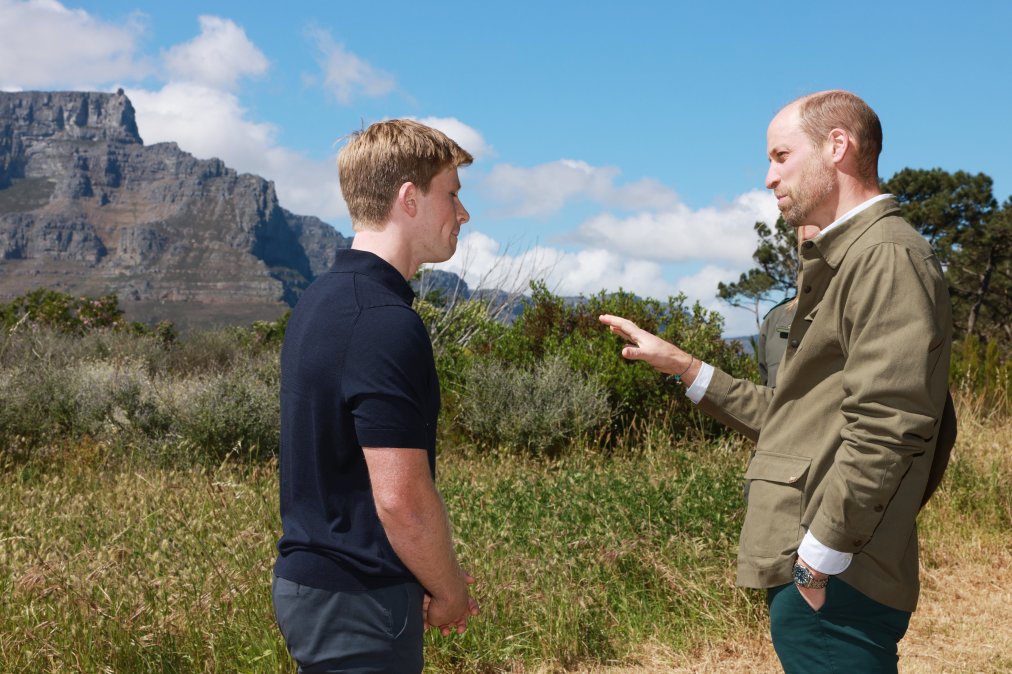 Prince William, Prince of Wales talks to Robert Irwin