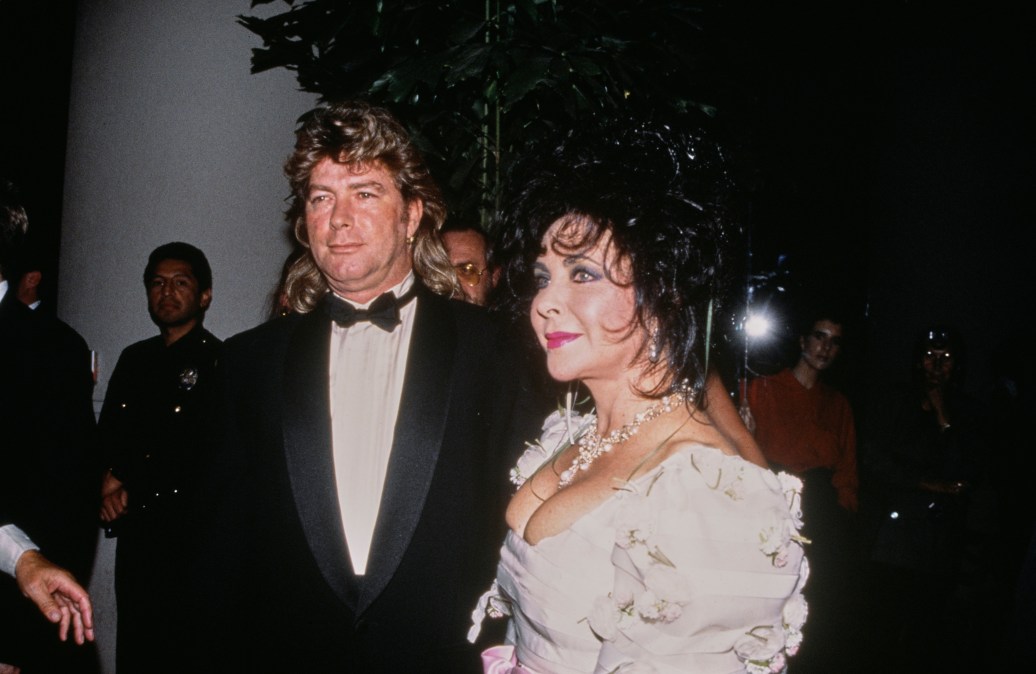 British-born actress Elizabeth Taylor (1932 - 2011) and husband Larry Fortensky attending the Carousel of Hope charity ball at the Beverly Hilton Hotel