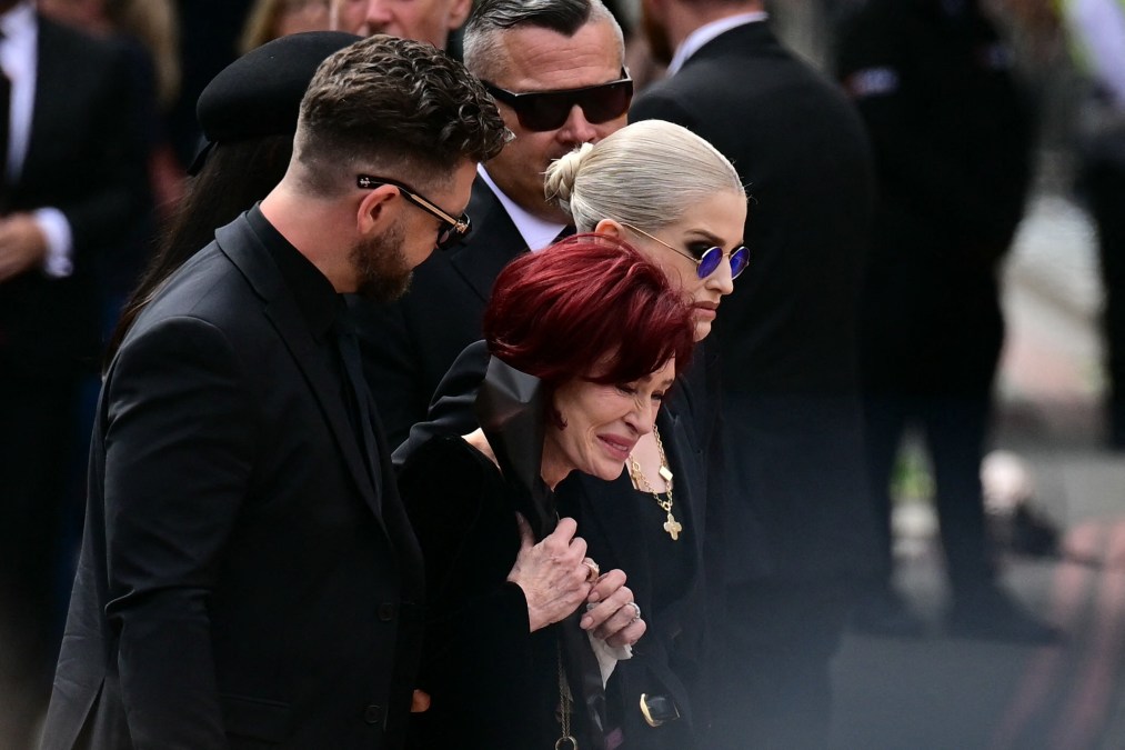 The family of Ozzy Osbourne, son Jack Osbourne (L), widow Sharon Osbourne (C), son Louis (back C), daughter Aimee (L obscured) and daughter Kelly Osbourne (R)