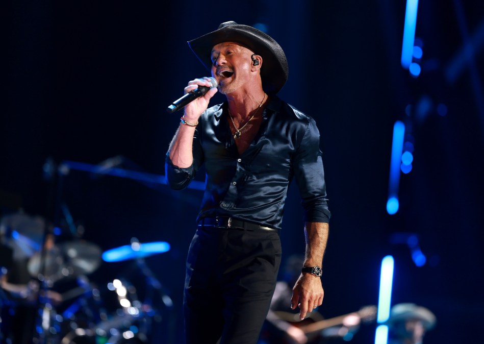 Tim McGraw singing at the 2025 iHeartRadio Music Festiva